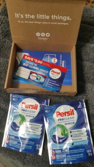 Sampler box with Persil detergent samples and coupon and inf card